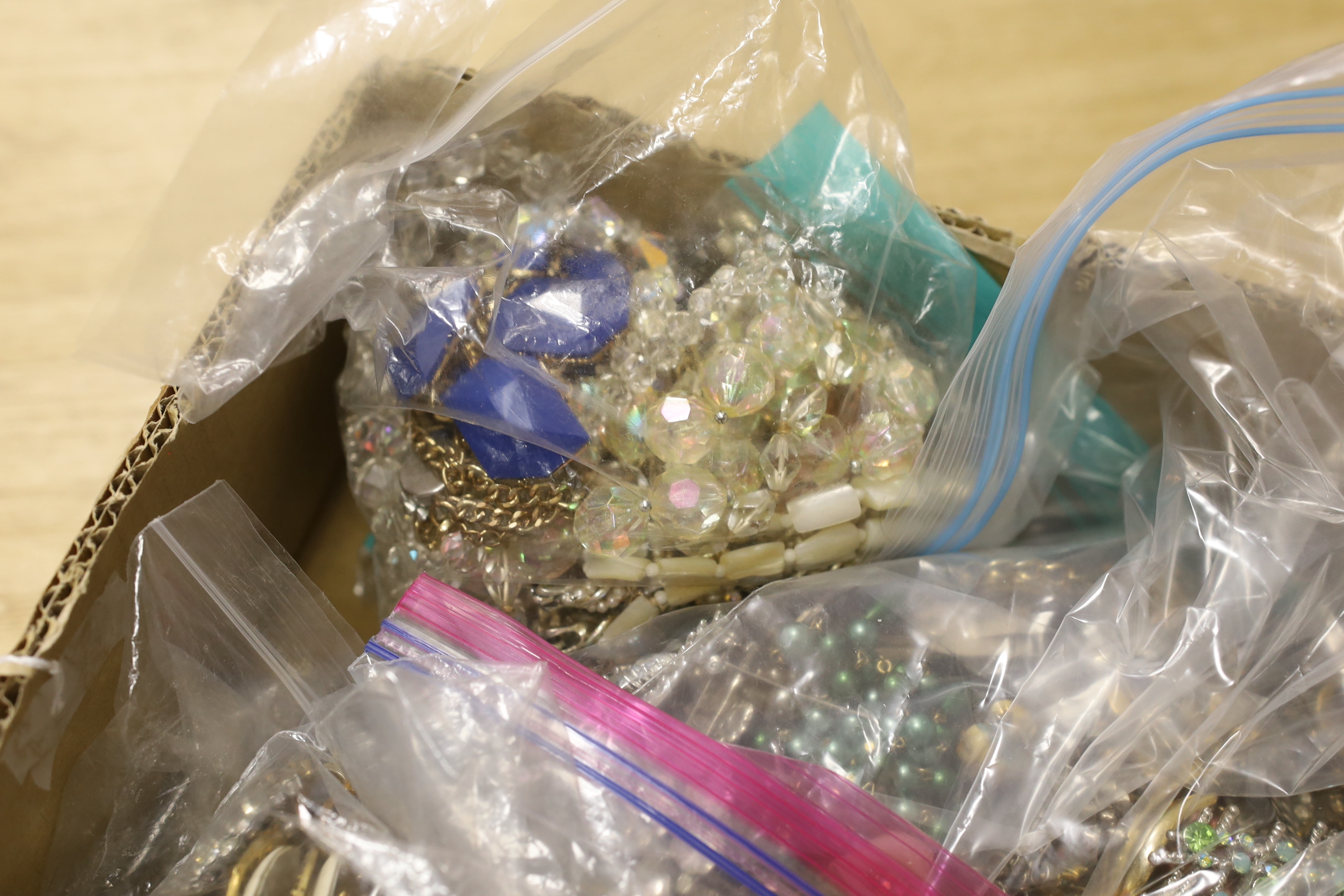 Ten bags of assorted costume jewellery, including necklaces, bracelets, brooches, etc.